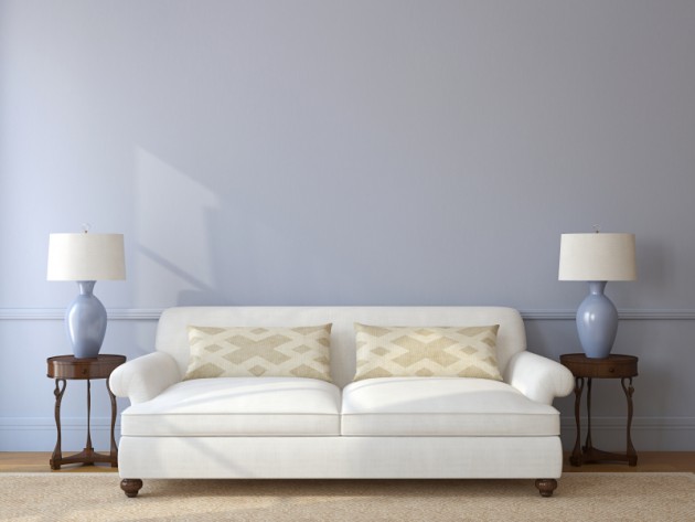 Light gray living room with a white couch