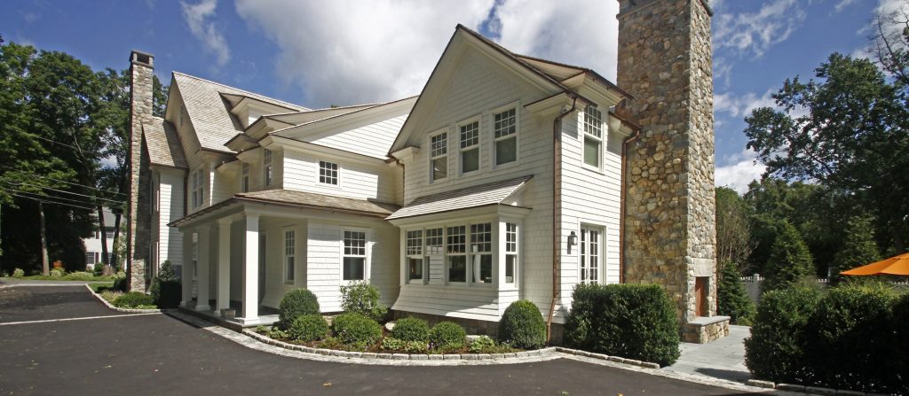 Exterior home in new england with white paint